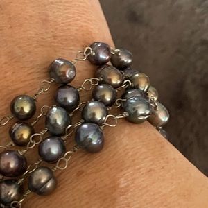 Sterling silver w/ freshwater pearls.